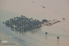 تصاویر هوایی از سیل در رودخانه کارون و روستای بامدژ